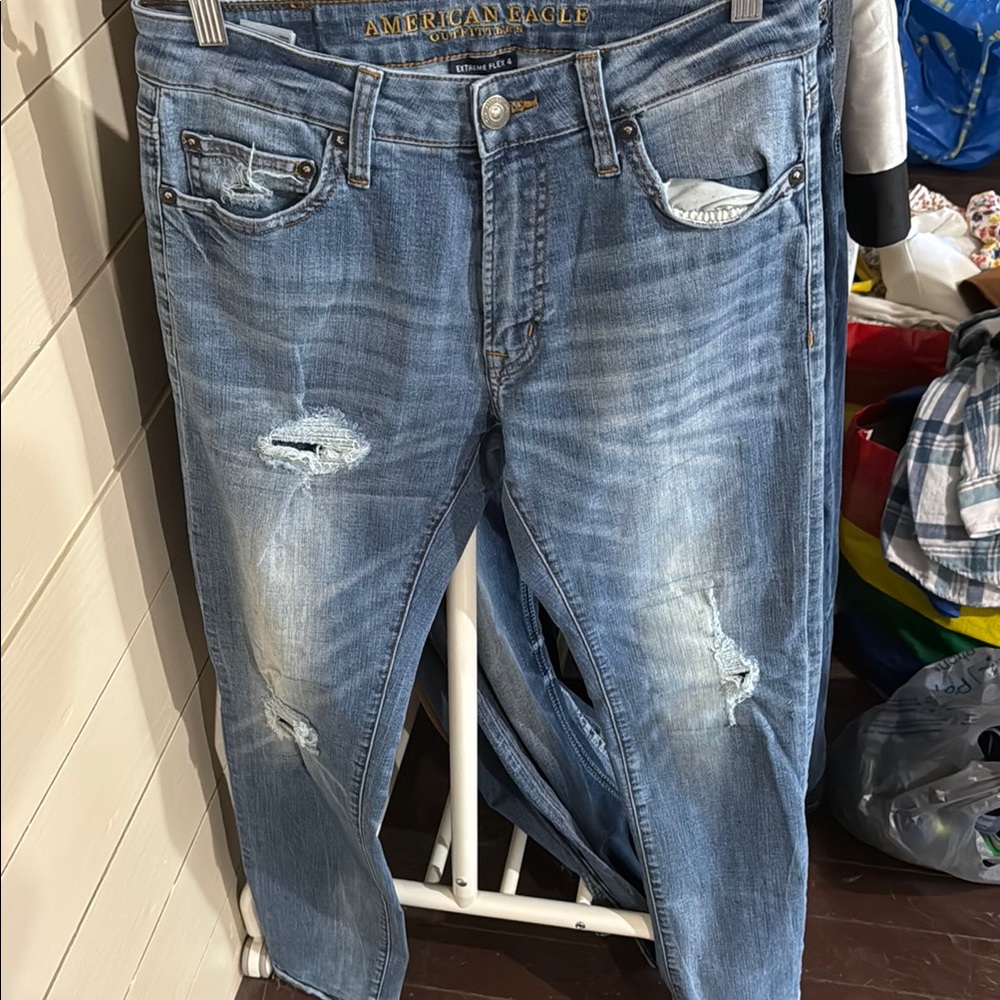 American Eagle Outfitters Blue Relaxed Fit Jeans with Distressed Details